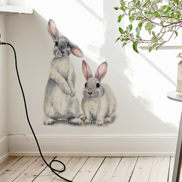 Wanddekoration mit zwei niedlichen Hasen für Mädchen mit weißem Hintergrund