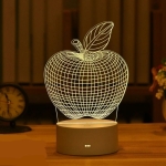 Stimmungsvolles Nachtlicht mit Apfelmotiv im 3D-Stil für Mädchen. Gute Qualität und sehr modisch auf einem Tisch in einem Haus