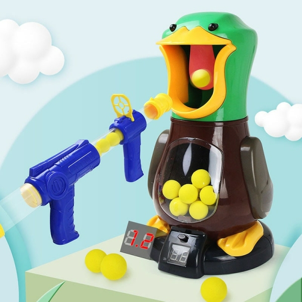 Luftpistolen-Schießspielzeug mit Entenmotiv für Mädchen mit grünem Hintergrund