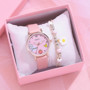 in einer Schmuckschatulle werden eine rosafarbene Uhr und ein passendes Armband präsentiert