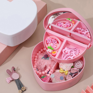 Herzförmiges Schmuckkästchen für Mädchen in Rosa mit mehreren Schmuckstücken