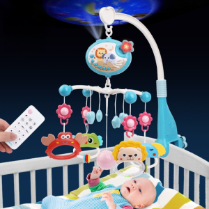 Musikalisches Mobile für die Wiege eines Baby-Mädchens mit einem dunkelblauen Hintergrund und einem Baby in seiner Wiege