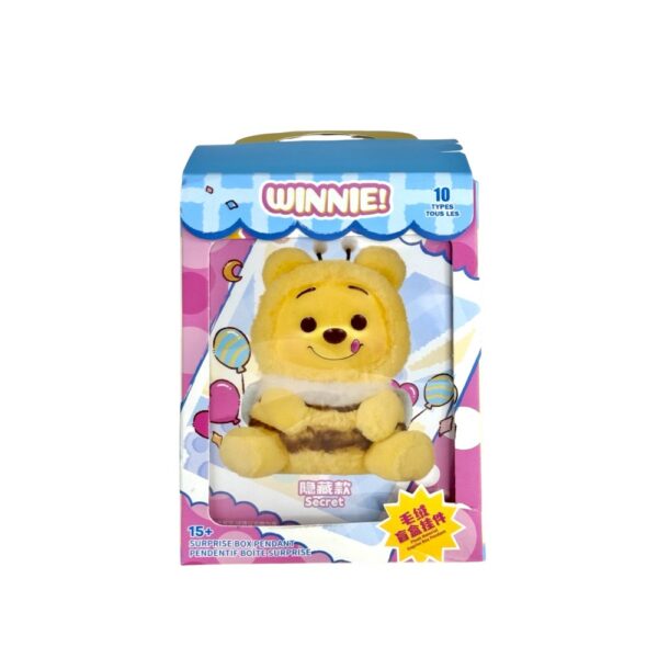 Rosa und blaue Box mit einer Zeichnung von Winnie Puuh auf der Vorderseite